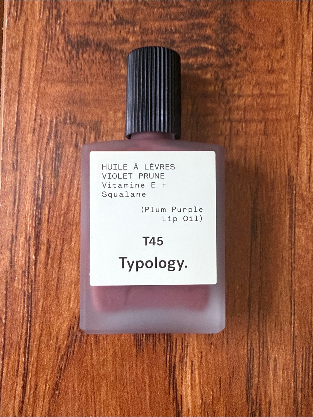 NWOT The Typology Tinted Lip Oil in shade T45 Plum Purple